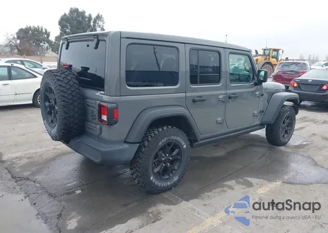 2021 Jeep Wrangler Unlimited Willys 4X4 z USA, uszkodzony, nr VIN 1C4HJXDG0MW849256